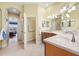 Elegant bathroom with double vanity and a large shower at 5510 E Longboat Blvd, Tampa, FL 33615