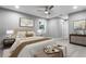 Cozy bedroom with soft lighting, neutral décor, and well-appointed furnishings and decorations at 11734 Orange Ct, Dade City, FL 33525