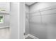 This walk-in closet features wire shelving and carpeted floor at 11734 Orange Ct, Dade City, FL 33525