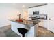 Kitchen island with granite countertop and stainless steel appliances at 13292 Golden Lime Ave, Spring Hill, FL 34609