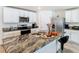 Modern kitchen with stainless steel appliances and granite countertops at 13292 Golden Lime Ave, Spring Hill, FL 34609