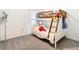 bedroom with a bunk bed and nautical theme at 13292 Golden Lime Ave, Spring Hill, FL 34609