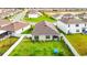 Aerial view of house and backyard, showcasing landscaping at 13292 Golden Lime Ave, Spring Hill, FL 34609