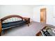 Bedroom with daybed and access to bathroom at 13292 Golden Lime Ave, Spring Hill, FL 34609