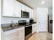 Kitchen with stainless steel appliances and granite counters at 13292 Golden Lime Ave, Spring Hill, FL 34609