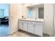 Bathroom with double vanity and shower at 13292 Golden Lime Ave, Spring Hill, FL 34609
