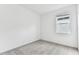 Simple bedroom with grey carpet and a window at 9418 Shorebird Ct, Parrish, FL 34219