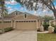 Image 1 of 16: 8617 Snowy Owl Way, Tampa