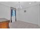 Elegant bedroom with chandelier and large window at 15908 Castle Park Ter, Lakewood Ranch, FL 34202