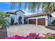 Luxury home with two-car garage and beautiful landscaping at 15908 Castle Park Ter, Lakewood Ranch, FL 34202