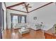 Relaxing Gathering room with hardwood floors, vaulted ceilings, and access to a patio at 15908 Castle Park Ter, Lakewood Ranch, FL 34202