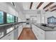 Modern kitchen with stainless steel appliances and white cabinetry at 15908 Castle Park Ter, Lakewood Ranch, FL 34202
