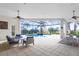 Open floor plan connecting the living space to the pool and patio at 15908 Castle Park Ter, Lakewood Ranch, FL 34202