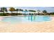 Community pool with water features and plenty of lounge space at 15908 Castle Park Ter, Lakewood Ranch, FL 34202