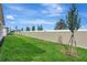 Well-kept backyard lawn and privacy fence create a serene and private outdoor space at 8328 Golden Beach Ct, Parrish, FL 34219