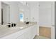 Bathroom with double vanity and neutral color scheme at 8328 Golden Beach Ct, Parrish, FL 34219