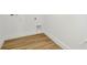 Small laundry room with tile floor and built-in cabinets at 8328 Golden Beach Ct, Parrish, FL 34219