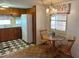 Small dining area with table and chairs in the kitchen at 39047 Ola Ave, Zephyrhills, FL 33542