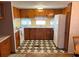Mobile home kitchen with wood cabinets and a tiled floor at 39047 Ola Ave, Zephyrhills, FL 33542