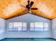 Spacious living room with wood ceiling and large windows at 1810 Haverford Ave, Sun City Center, FL 33573