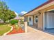 House exterior with a carport and landscaping at 1810 Haverford Ave, Sun City Center, FL 33573
