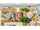 Aerial perspective of two houses and surrounding neighborhood at 1810 Haverford Ave, Sun City Center, FL 33573