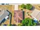 Aerial view of property, showing the house and surrounding area at 1810 Haverford Ave, Sun City Center, FL 33573
