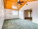 Living room with wood ceiling, carpet, and French doors at 1810 Haverford Ave, Sun City Center, FL 33573