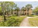 Two-story building with lush landscaping and walkways at 1228 S. Missouri Ave # 607, Clearwater, FL 33756