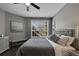 Spacious bedroom with large window and gray bedding at 1228 S. Missouri Ave # 607, Clearwater, FL 33756