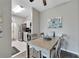 Bright dining area with a table and four chairs, near the kitchen at 1228 S. Missouri Ave # 607, Clearwater, FL 33756