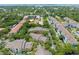 Aerial view of condo community showcasing building location and parking at 1228 S. Missouri Ave # 607, Clearwater, FL 33756
