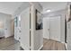 Clean hallway with white doors and light gray walls at 1228 S. Missouri Ave # 607, Clearwater, FL 33756