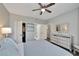 Spacious bedroom with a dresser and ceiling fan at 1228 S. Missouri Ave # 607, Clearwater, FL 33756