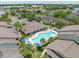 Aerial view of community pool and surrounding condo buildings at 1228 S. Missouri Ave # 607, Clearwater, FL 33756