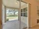 Peaceful screened patio overlooking a lush green view at 1013 Emerald Dunes Dr, Sun City Center, FL 33573