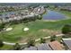 Aerial view of golf course community at 1013 Emerald Dunes Dr, Sun City Center, FL 33573