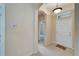 Light and airy entryway with tile flooring and view to living area at 1013 Emerald Dunes Dr, Sun City Center, FL 33573