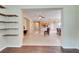 Open living room with view of kitchen and dining area at 1013 Emerald Dunes Dr, Sun City Center, FL 33573