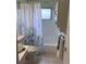 Clean bathroom with a tub and shower at 10032 36Th N St, Pinellas Park, FL 33782