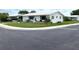 Ranch-style home with a well-manicured lawn at 10032 36Th N St, Pinellas Park, FL 33782