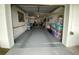 Garage with overhead storage and ample space for cars and storage at 10032 36Th N St, Pinellas Park, FL 33782