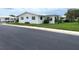 Ranch-style home with a side view and lawn at 10032 36Th N St, Pinellas Park, FL 33782