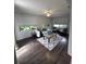 Spacious living room with hardwood floors and comfy seating at 10032 36Th N St, Pinellas Park, FL 33782