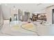 Open floor plan with modern furniture and a view of the kitchen at 6018 Kipps Colony E Dr, Gulfport, FL 33707