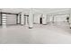 Spacious garage with epoxy flooring and ample storage at 6018 Kipps Colony E Dr, Gulfport, FL 33707