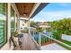 Relaxing balcony overlooking a tranquil pond at 6018 Kipps Colony E Dr, Gulfport, FL 33707