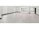 Large garage with epoxy flooring and high ceilings at 6018 Kipps Colony E Dr, Gulfport, FL 33707