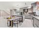 Modern kitchen with stainless steel appliances and breakfast bar at 6018 Kipps Colony E Dr, Gulfport, FL 33707