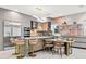 Modern kitchen with island, stainless steel appliances, and stylish decor at 6018 Kipps Colony E Dr, Gulfport, FL 33707